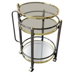 Hollywood Regency Gold and Charcoal Three Tear Mirrored Swivel Top Beverage Cart