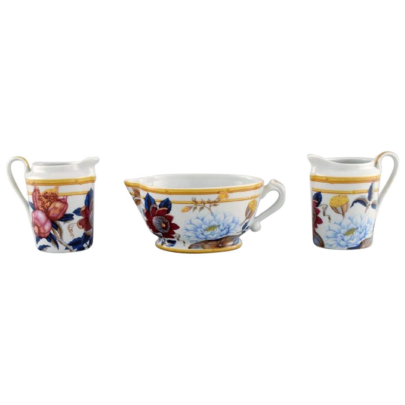 Porcelain of Paris. "Tropical Aurore". Three porcelain jugs with flowers. For Sale