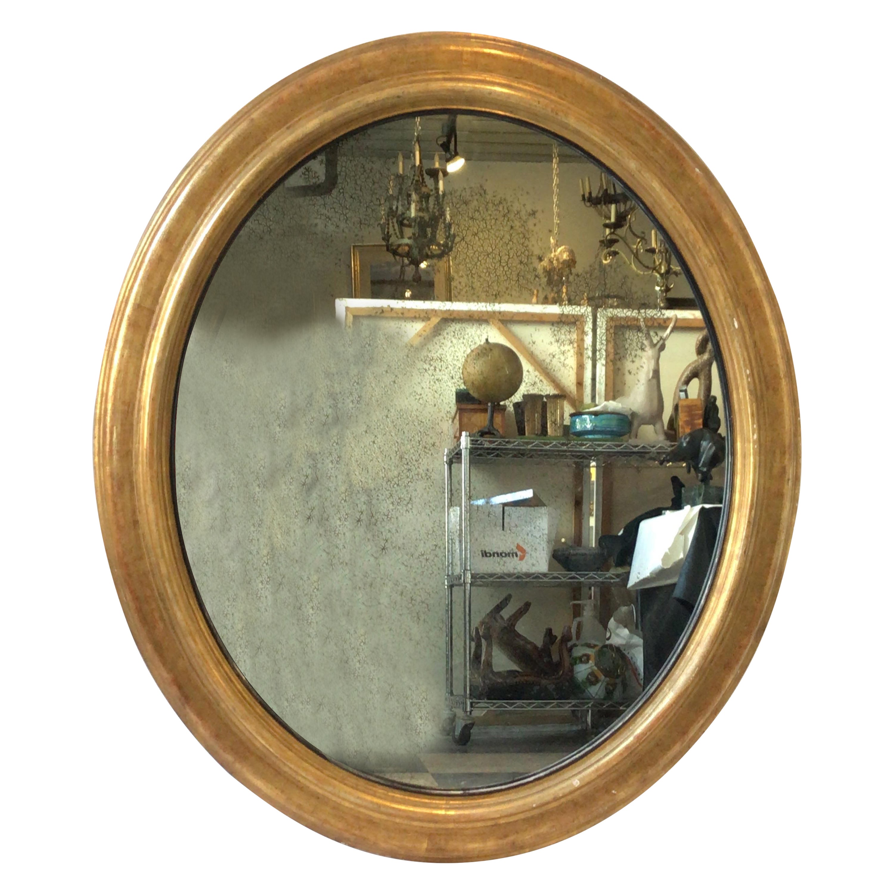 Grand miroir ovale en bois doré avec verre vieilli en vente