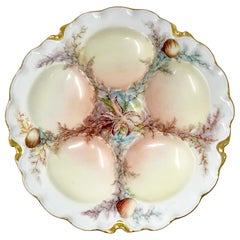 Ancienne assiette à huîtres française en porcelaine de Limoges rose, jaune et or, vers 1880