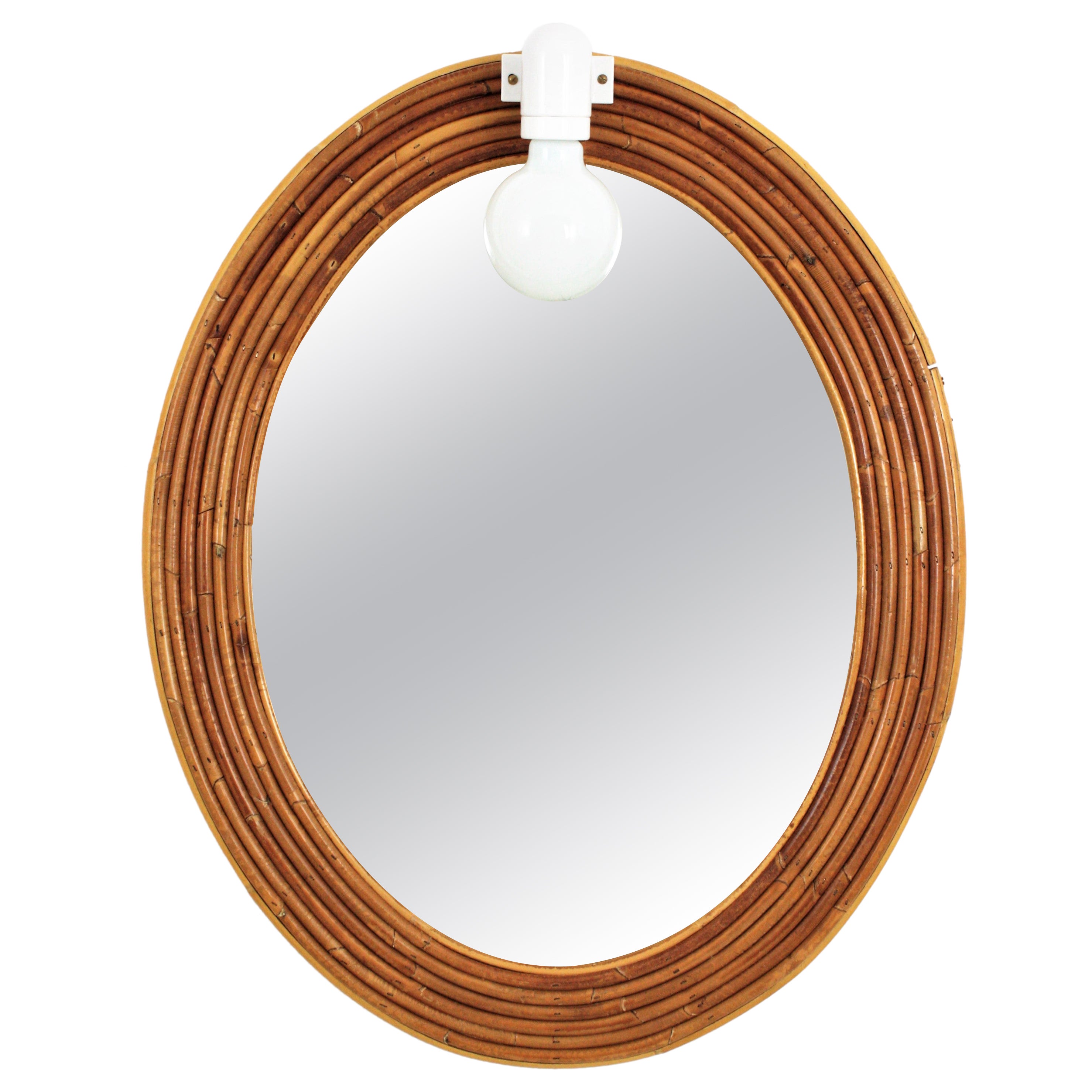 Vivai del Sud Rattan Oval Mirror with Wall Light For Sale