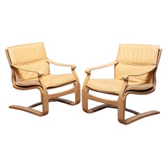 Pair Bentwood with Beige / Creme Leather Lounge Chairs by Ake Fribytter for Nelo