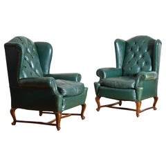 Pair English Queen Anne Style Green Tufted Leather Wingchairs, 1st half 20th cen