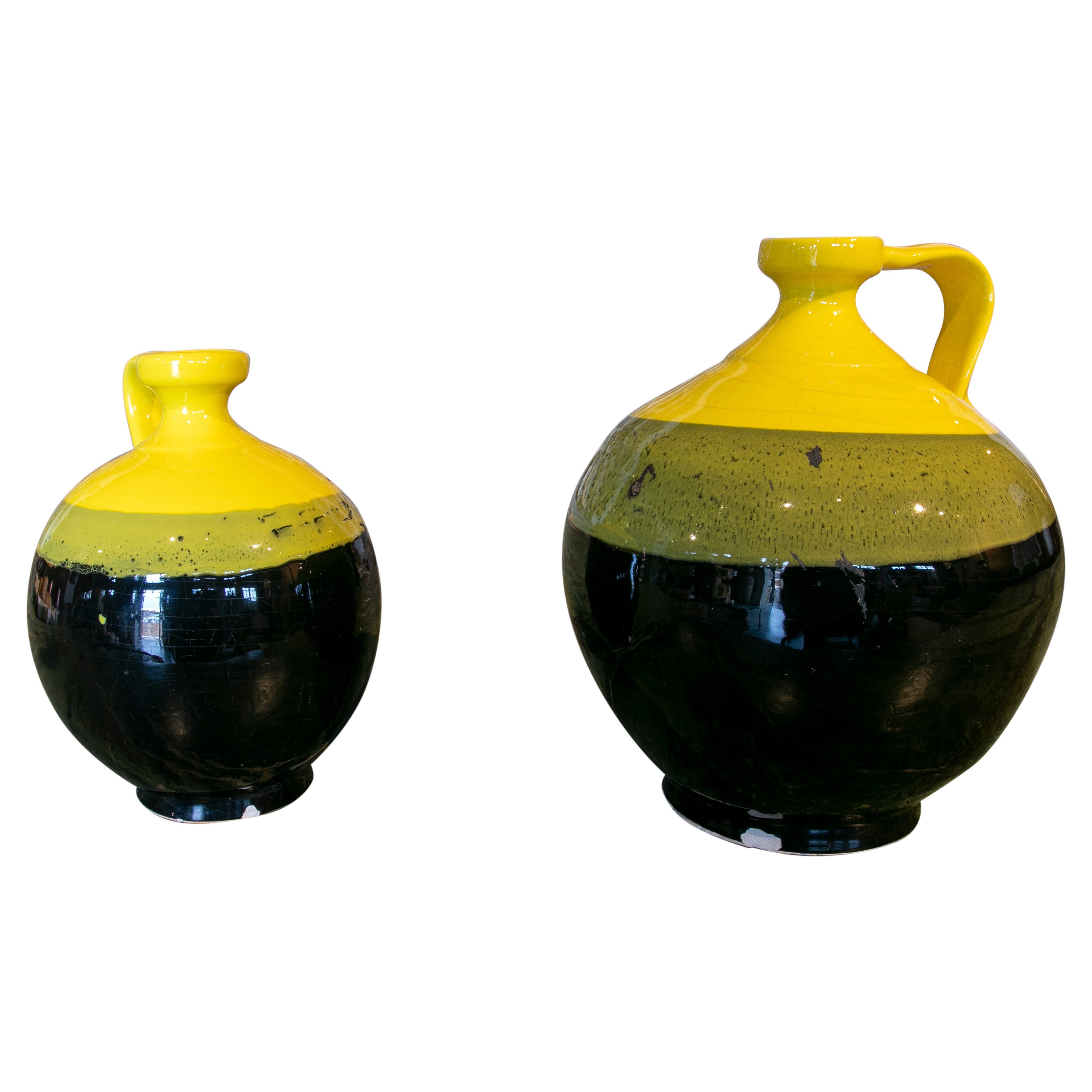 Pair of Spanish Glazed Ceramic Jug with Handle in Tones of Black and Yellow