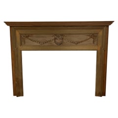 Early 20th Century Used Wood Mantel with Carved Wood Center Panel