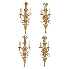 Set of Four French Gilt Wood & Gesso Foliate Ribbon Two Arm Wall Sconces, C 1830