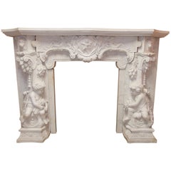 Vintage White Statuary Marble Fireplace, Richly Carved with Cherubs, Cupid, Dogs, Italy