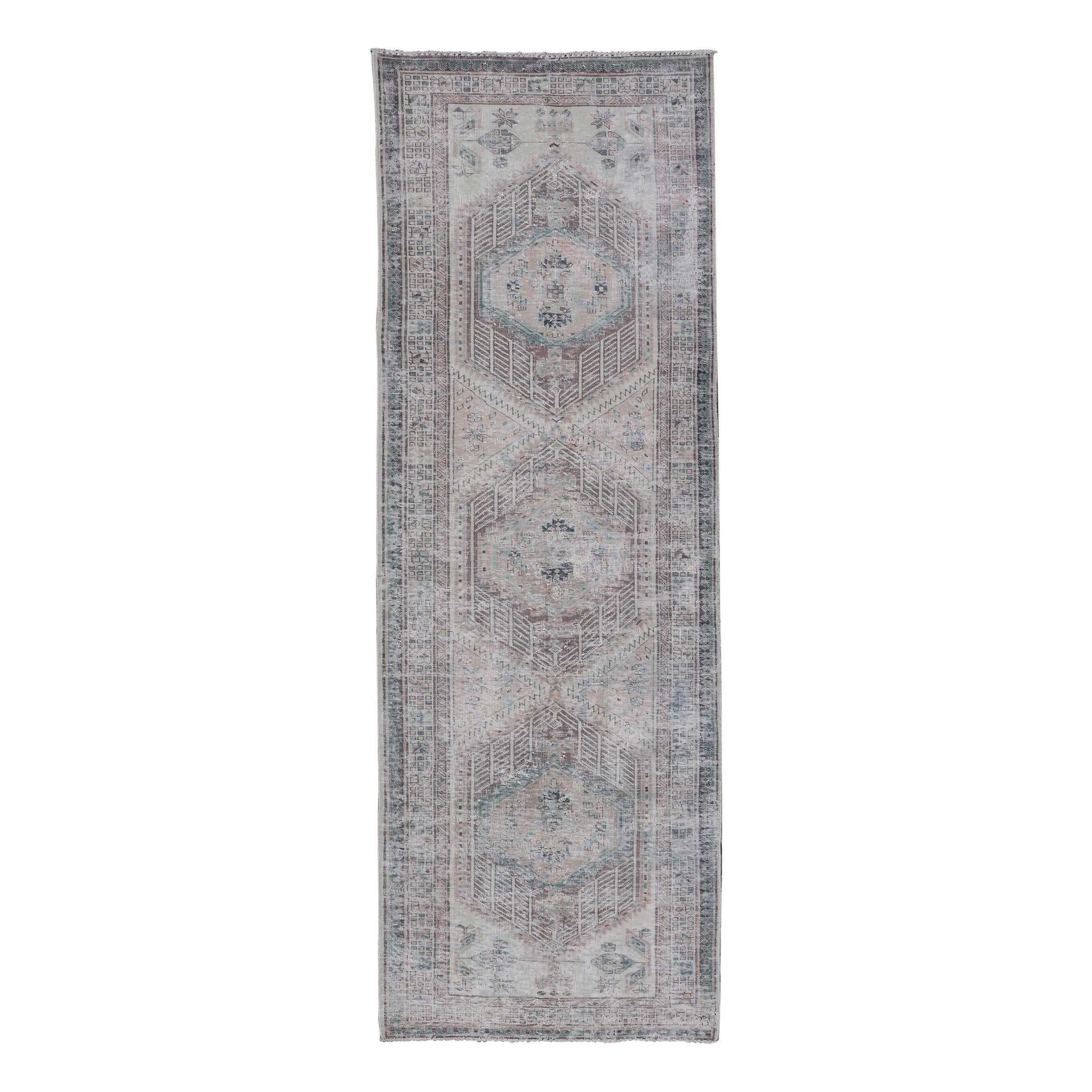 Vintage Persian Heriz Distressed Rug with Muted Colors & Medallion Design