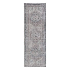 Vintage Persian Heriz Distressed Rug with Muted Colors & Medallion Design