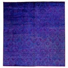 Tapis moderne en laine carrée bleu et violet fait à la main avec motif floral