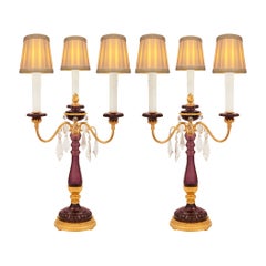 Pair of French Turn of the Century Louis XVI St. Amethyst Colored Glass Lamps