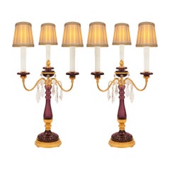 Pair of French Turn of the Century Louis XVI St. Amethyst Colored Glass Lamps