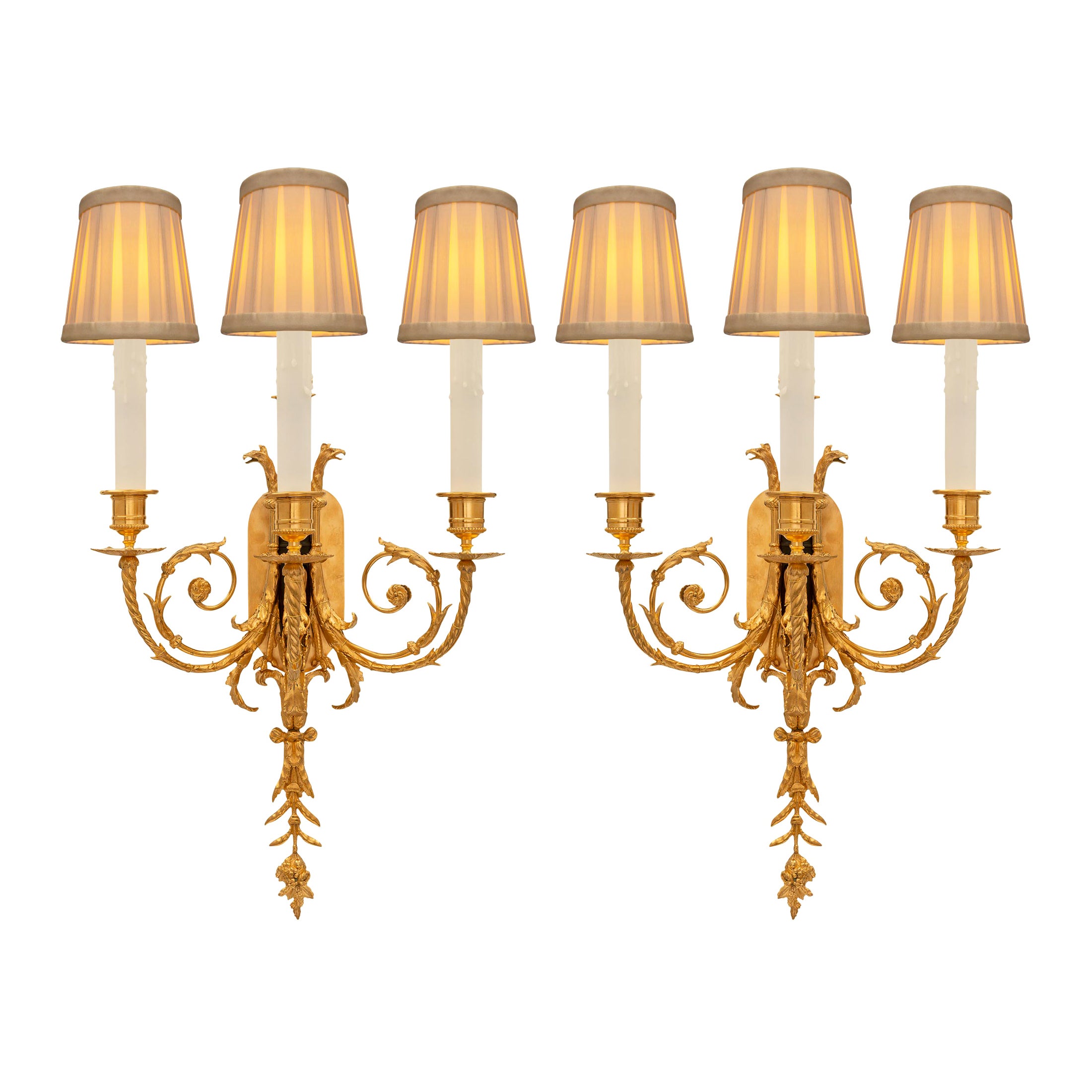 Pair of French 19th Century Louis XVI St. Ormolu and Patinated Bronze Sconces