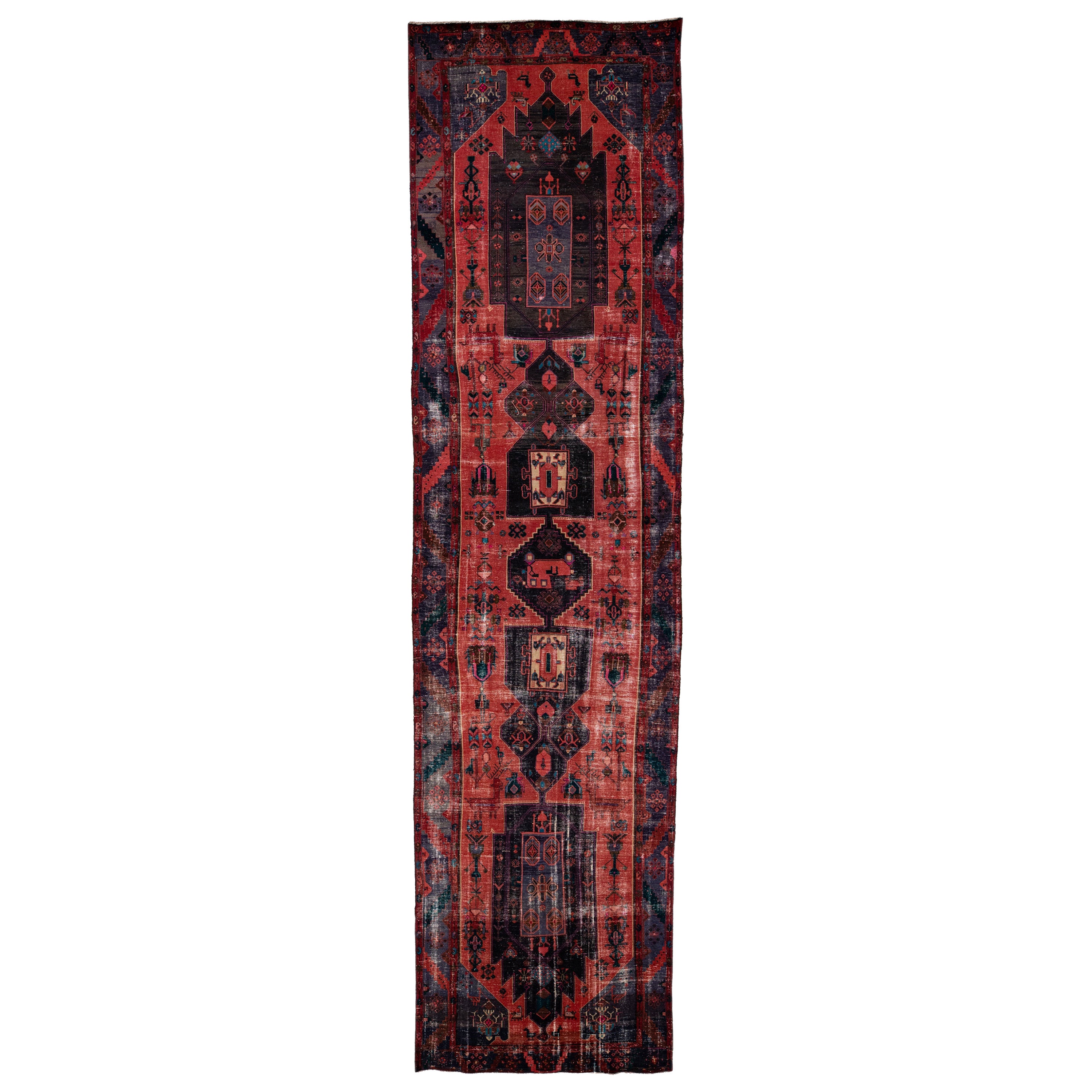 Antique Persian Heriz Red Handmade Wool Runner with Multicolor Tribal Design For Sale