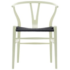 CH24 Wishbone Chair in Light Green with Black Papercord Seat by Hans Wegner
