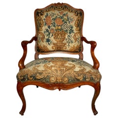 Antique 19th Century French Carved Walnut Needlepoint Armchair.