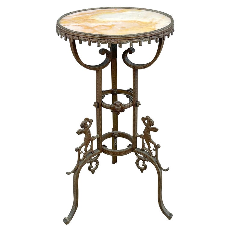 Antique Victorian Style End Table with Angel Motifs and Stone Top For