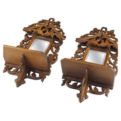Pair of Antique Black Forest Carved Wood Console Mirrors