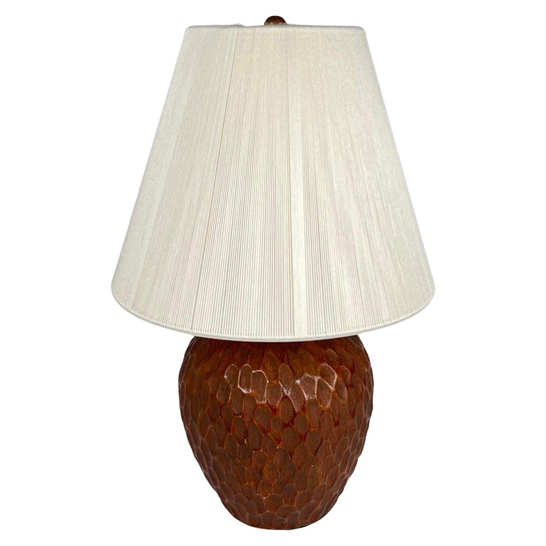 An Elegant table lamp with a Martelée (Hammered) Ceramic base in Opaque Maroon on the Style of Jean Besnard.
Made in France
Circa: 1950
