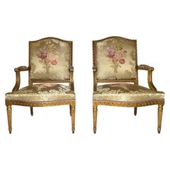 Pair of Antique French Louis XVI Carved Gold Leaf Armchairs, circa 1890