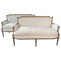 Elegant Pair of French Louis XVI Style Carved Wood & Newly Upholstered Sofas