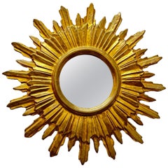 Large Starburst Sunburst Gilded Wood and Stucco Mirror, circa 1930s