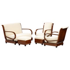 Italian 1920's Carved Walnut Settee, Pair of Armchairs and Ottomans