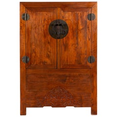 Chinese Qing Dynasty 19th Century Armoire with Carved Skirt and Large Medallion