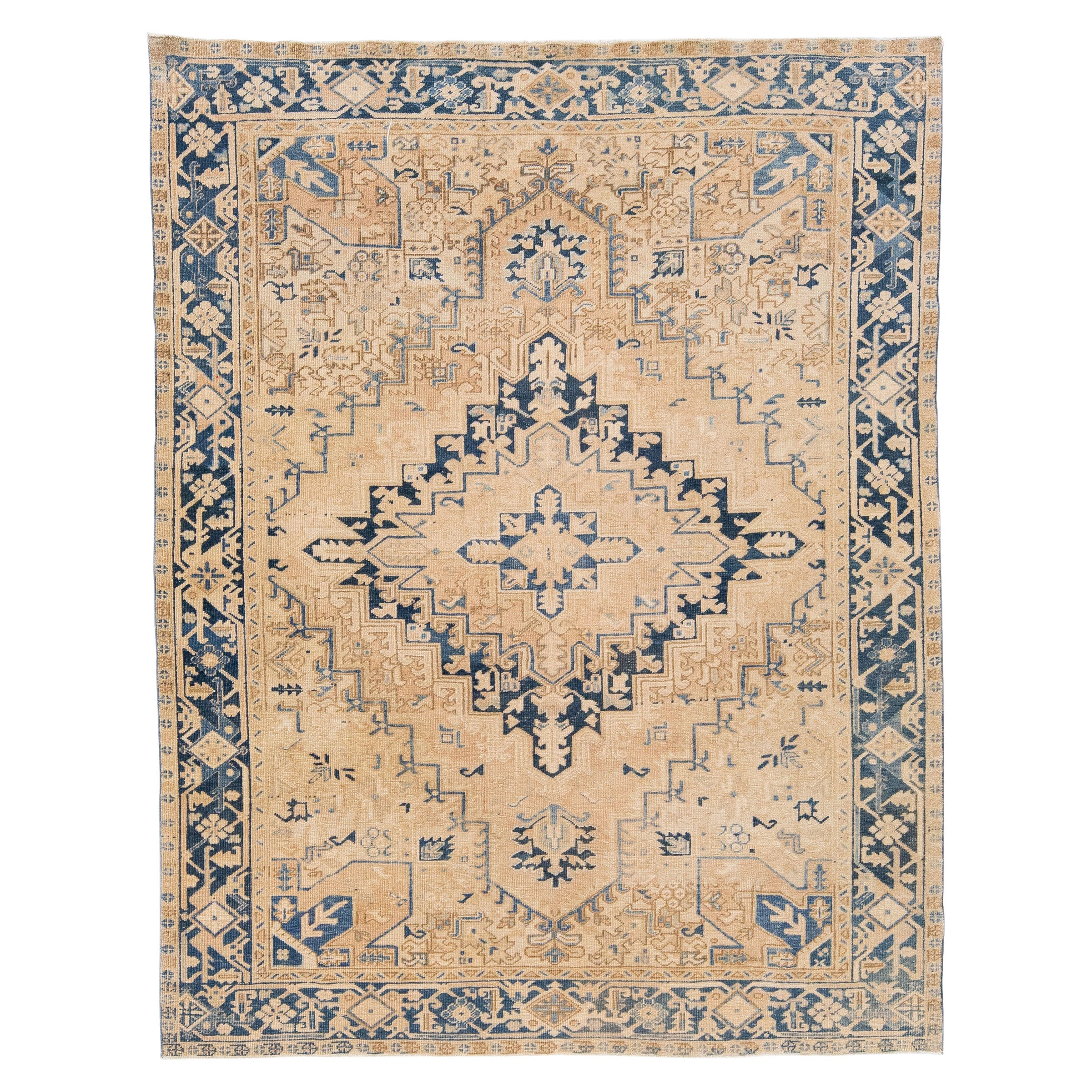 Tan Antique Persian Heriz Handmade Wool Rug with Medallion Design For Sale