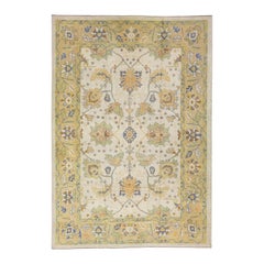 Tapis moderne turc Oushak beige en laine à motifs floraux fait à la main