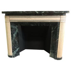 Vintage mantel fireplace in green and white marble, art Decò, Italy