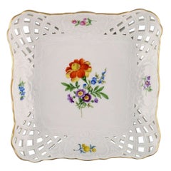 Square Meissen dish / bowl in openwork porcelain with hand-painted flowers.