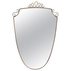Mid-Century Italian Wall Mirror with Brass Frame and Top Flourish 'circa 1950s'