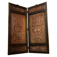 19th Century Hardwood Red and Ebonized Carved Figural Two-Panel Screen