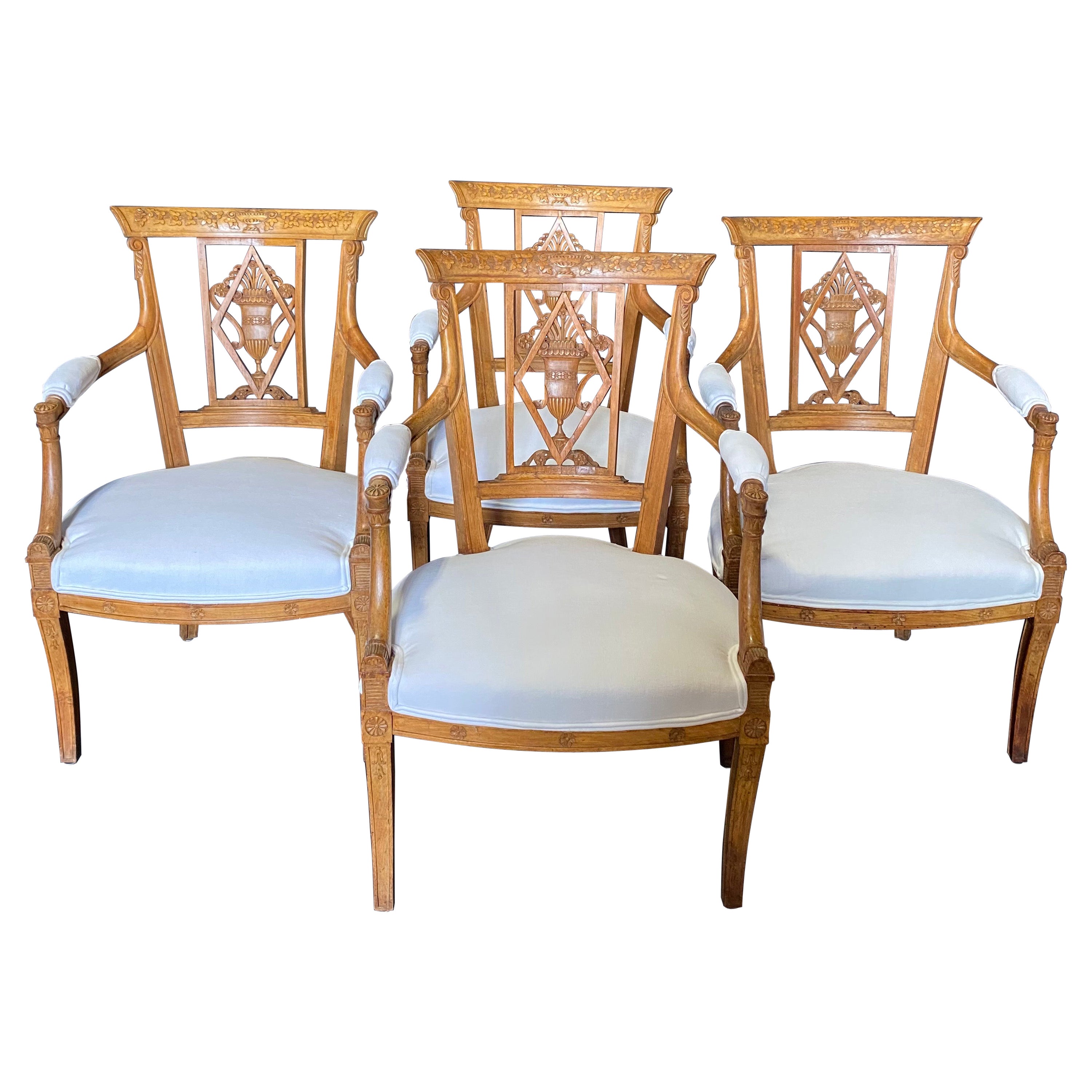 Set of Four 19th Century French Walnut Carved Neoclassical Dining Armchairs For Sale