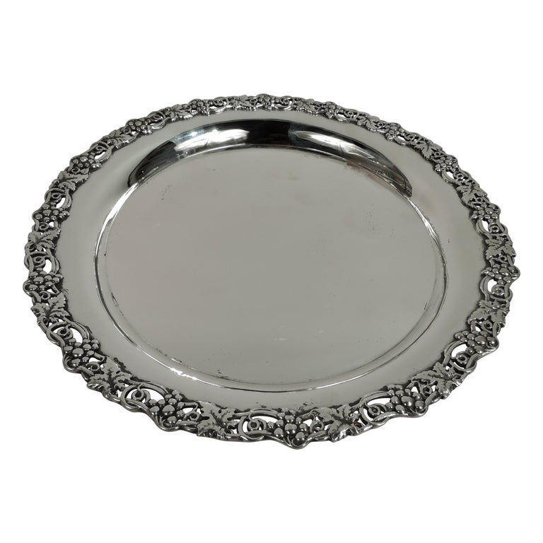 Lot - A George V silver wine bottle coaster Mappin & Webb Ltd