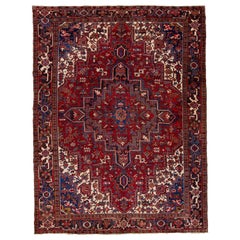 Antique Persian Heriz Handmade Red & Blue Wool Rug with Medallion Motif