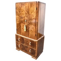 A French Art Deco High End Figured Walnut Tallboy, c1930,