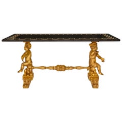 Table basse/table de cocktail baroque italienne du 19ème siècle en bois doré et bois patiné