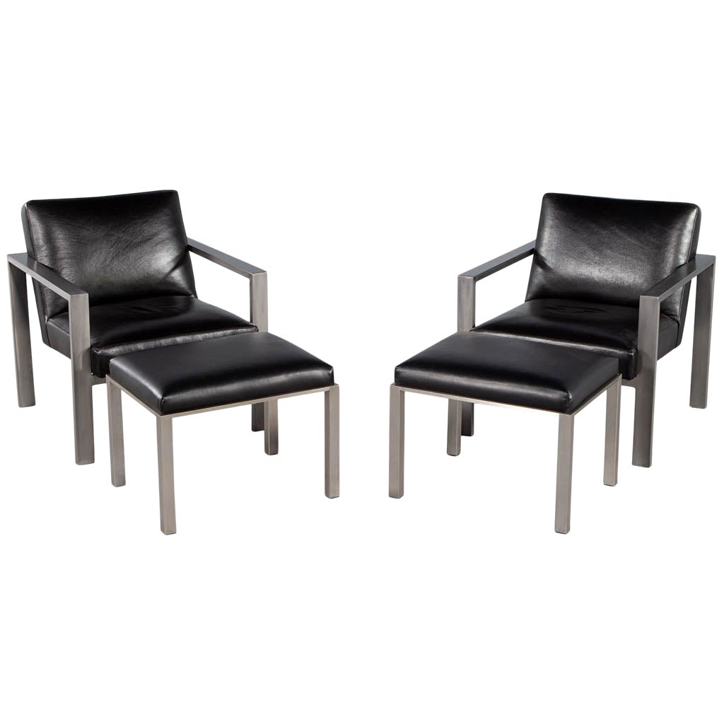 Pair of Mid-Century Modern Black Leather Metal Lounge Chairs with Ottomans For Sale