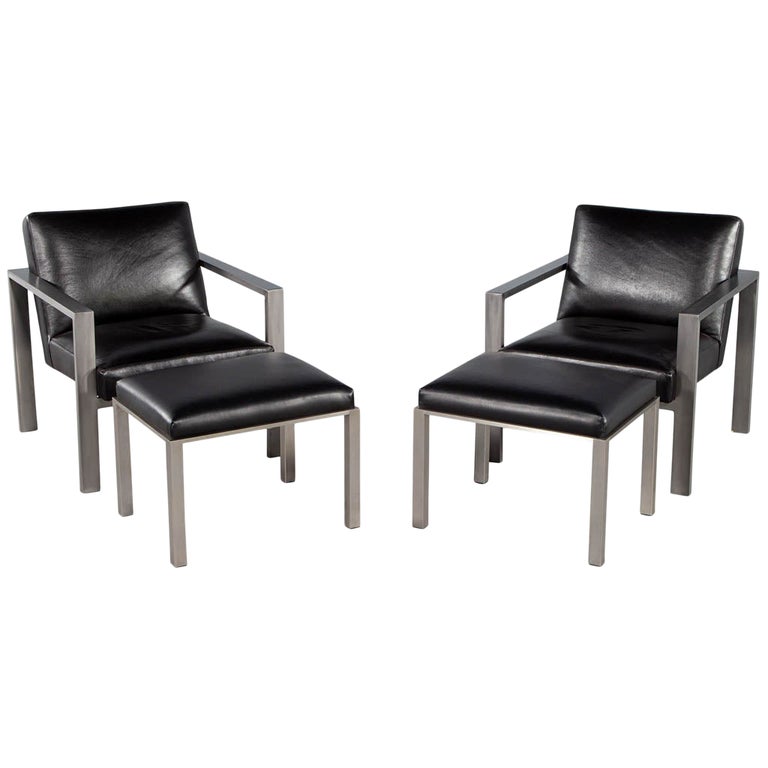 Pair of Mid-Century Modern Black Leather Metal Lounge Chairs with Ottomans For Sale
