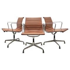 Ensemble de 12 chaises rares Vitra EA107 en aluminium couleur cognac de Charles Eames