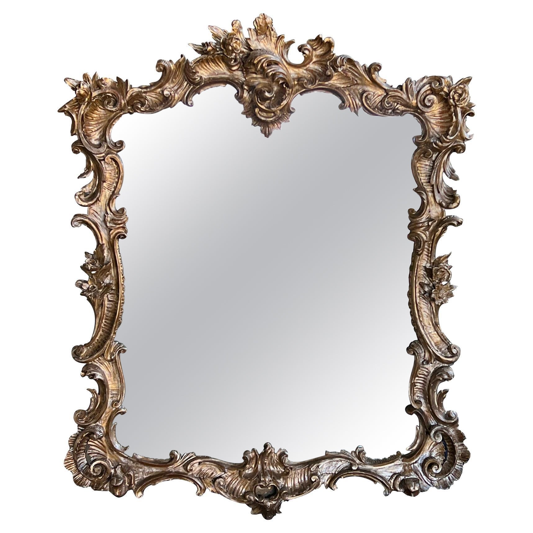 French Rococo Style Carved Giltwood Mirror For Sale