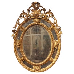Antique French Napoleon III Giltwood Mirror with Musical Trophy Decor, C. 1860