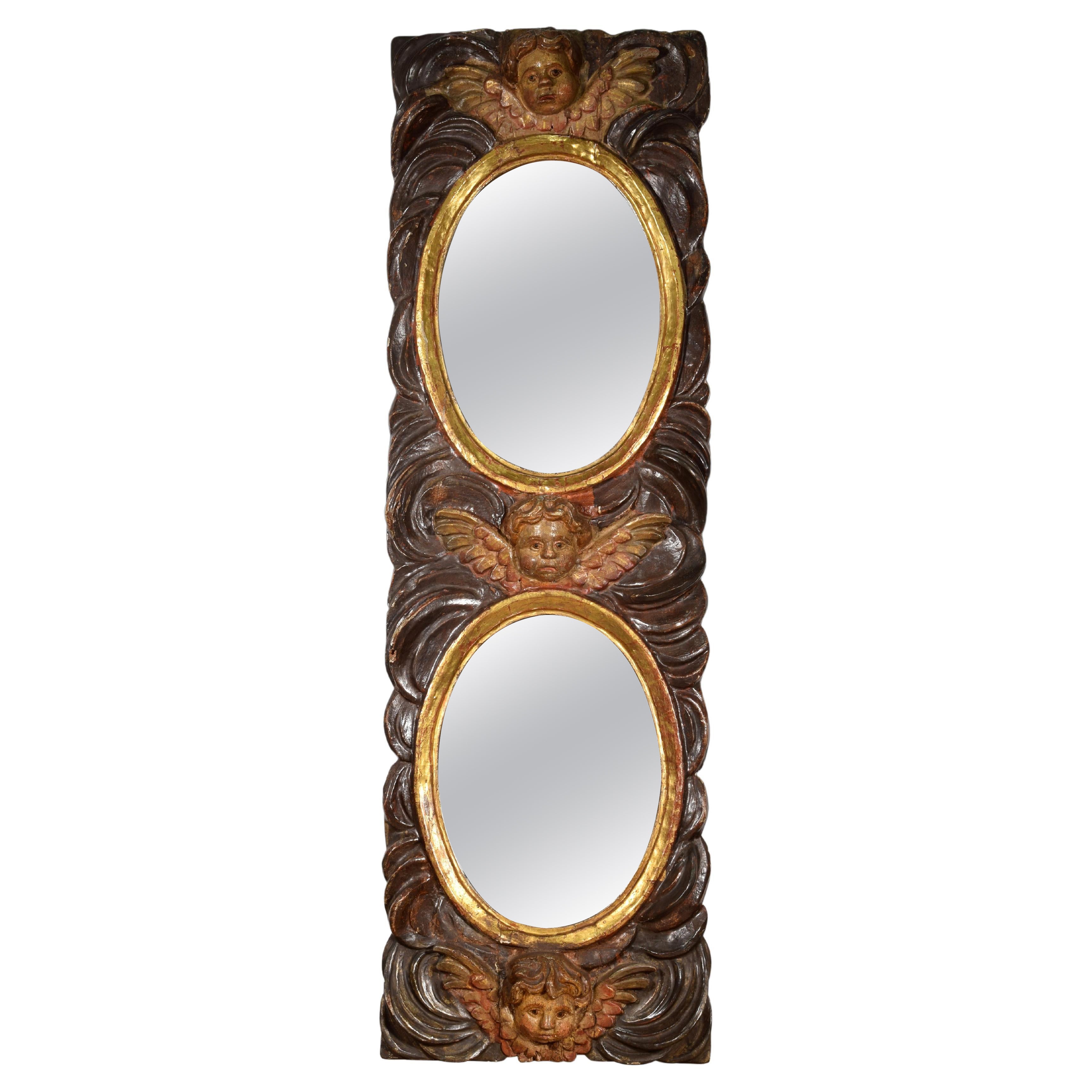 Mirror with angel heads. Carved and polychrome pine wood. Spanish school, 18th c For Sale