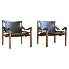 Paire de fauteuils de salon en cuir et frêne Sirocco d'Arne Norell, AB Aneby, 1970