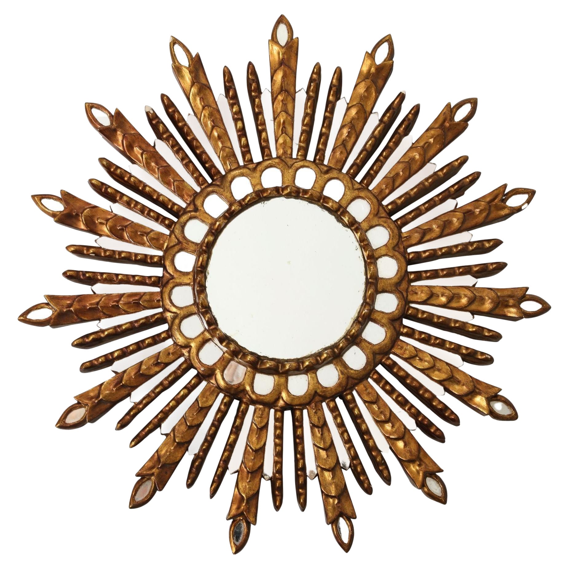 Espejo Sunburst de madera dorada tallada