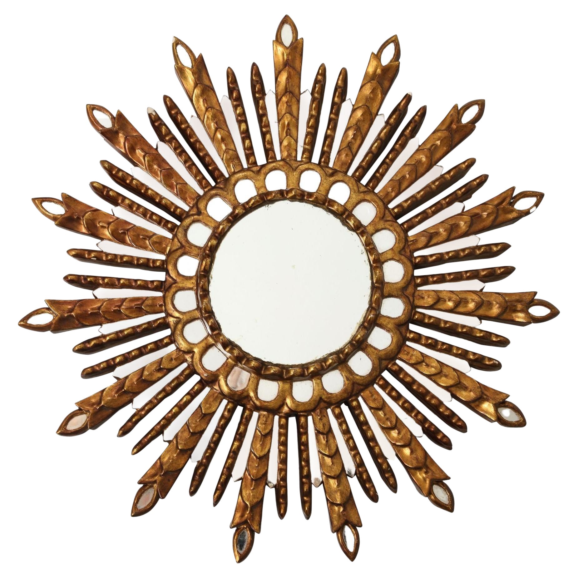 Miroir Sunburst en bois sculpté et doré en vente