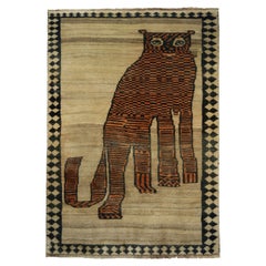 Tapis persan Gabbeh vintage beige, orange, graphique tigre par Rug & Kilim