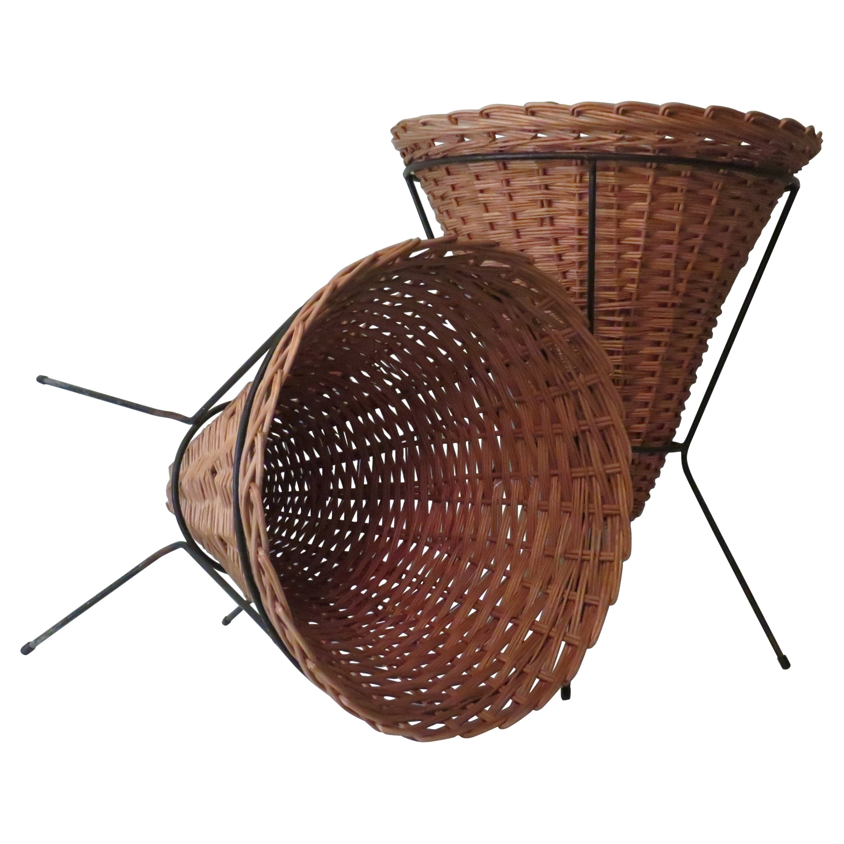 Rohé & Noordwolde, set of 2 wicker display baskets in metal base.